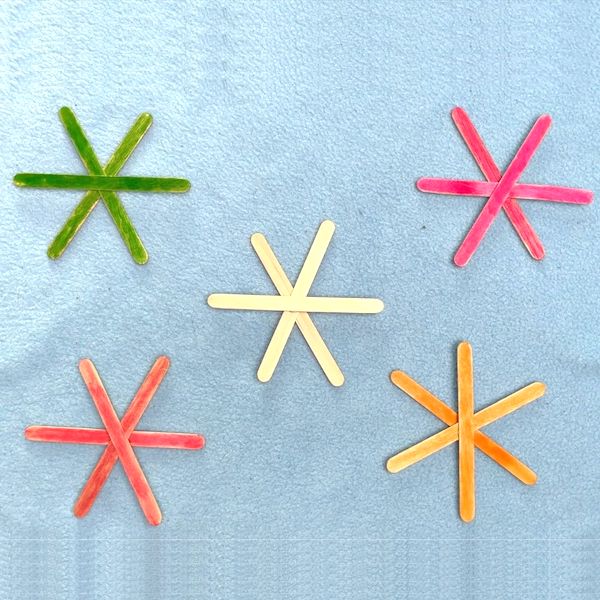how to make snowflakes out Popsicle stick